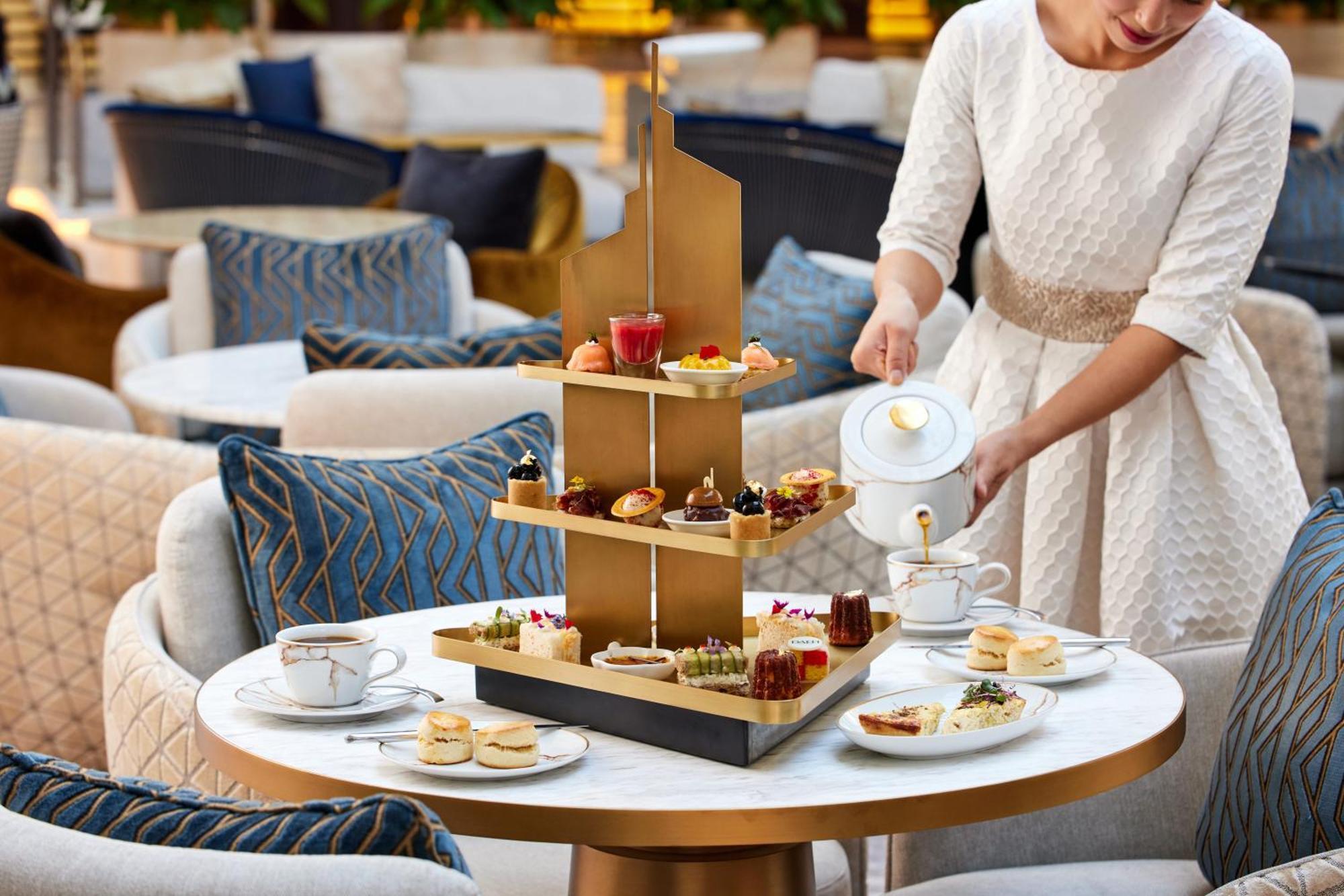 Jumeirah Emirates Towers Dubai Exterior photo Afternoon tea at the Ritz-Carlton, DIFC, Dubai
