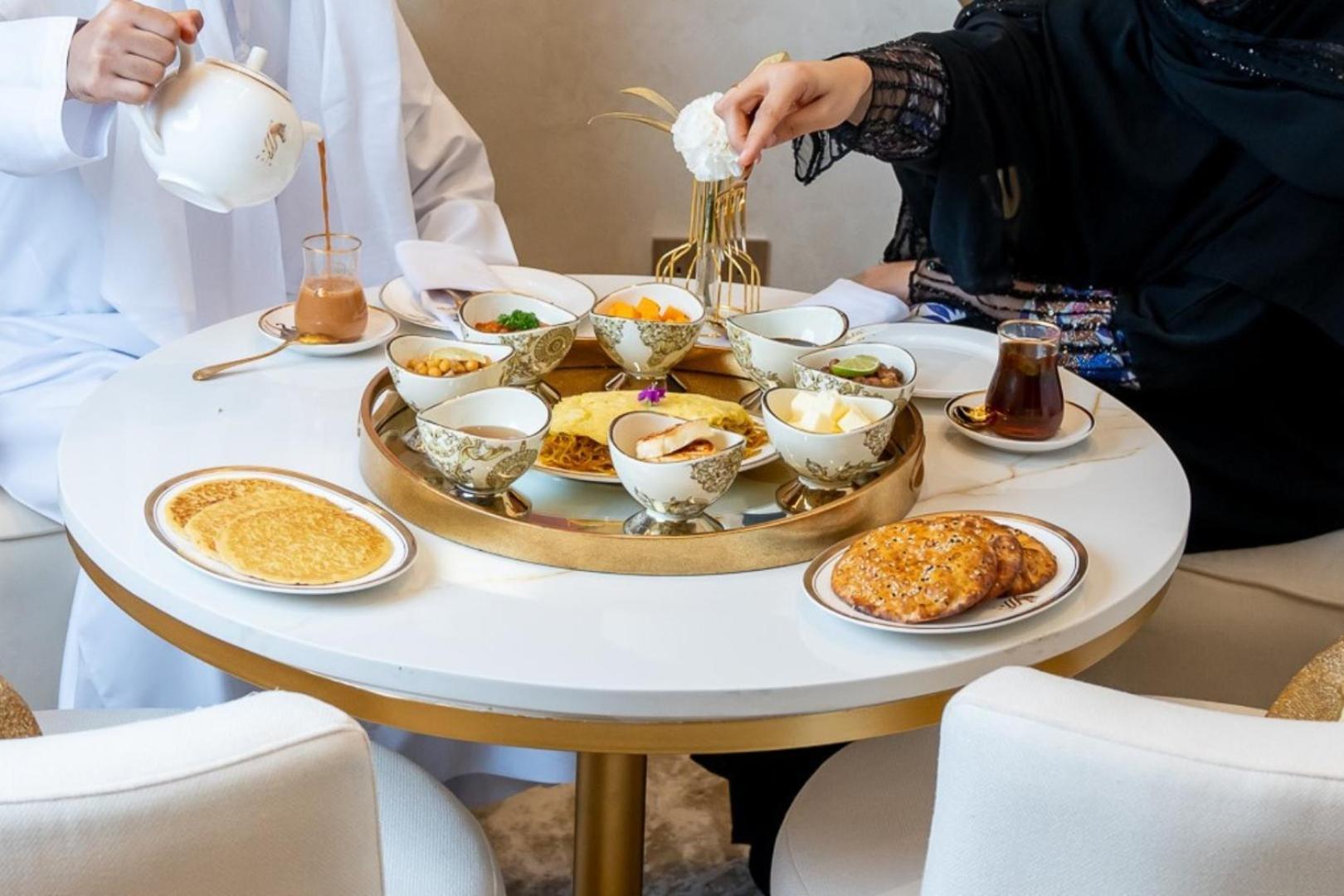 Jumeirah Emirates Towers Dubai Exterior photo A traditional Emirati breakfast